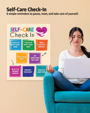 Woman sitting on a blue chair using a laptop with a 'Self-Care Check-In' poster on the wall.