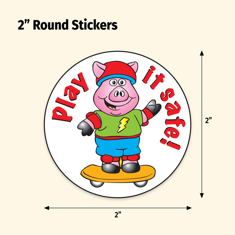 Circular sticker with a cartoon pig character and text 'Play it safe!' on a beige background