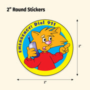 Circular sticker with cartoon cat holding a phone, labeled 'Emergency! Dial 911', on a beige background.