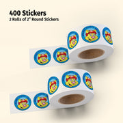 Two rolls of 2-inch round stickers with a cartoon character on a beige background.
