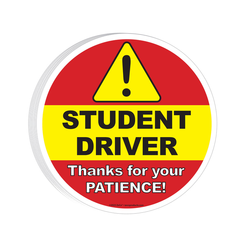 Round sign with a warning triangle, text 'STUDENT DRIVER Thanks for your PATIENCE!' on a red and yellow background.